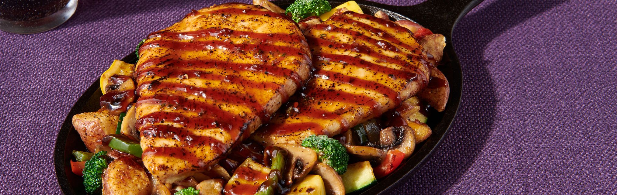 Denny's bourbon chicken skillet over a veggie medley
