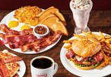 Denny's Baconalia menu featuring triple bacon sampler, bacon obsession burger, bacon pancakes, bacon milkshake, and coffee