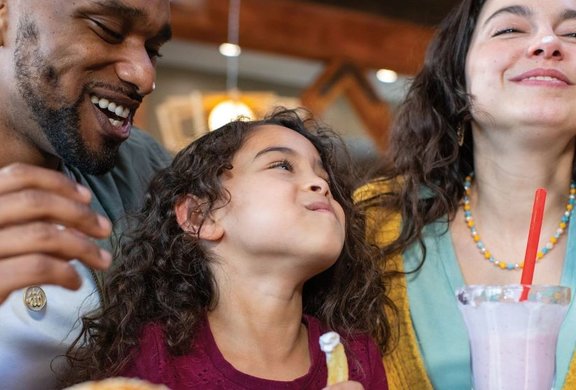 Happy family enjoying a meal together